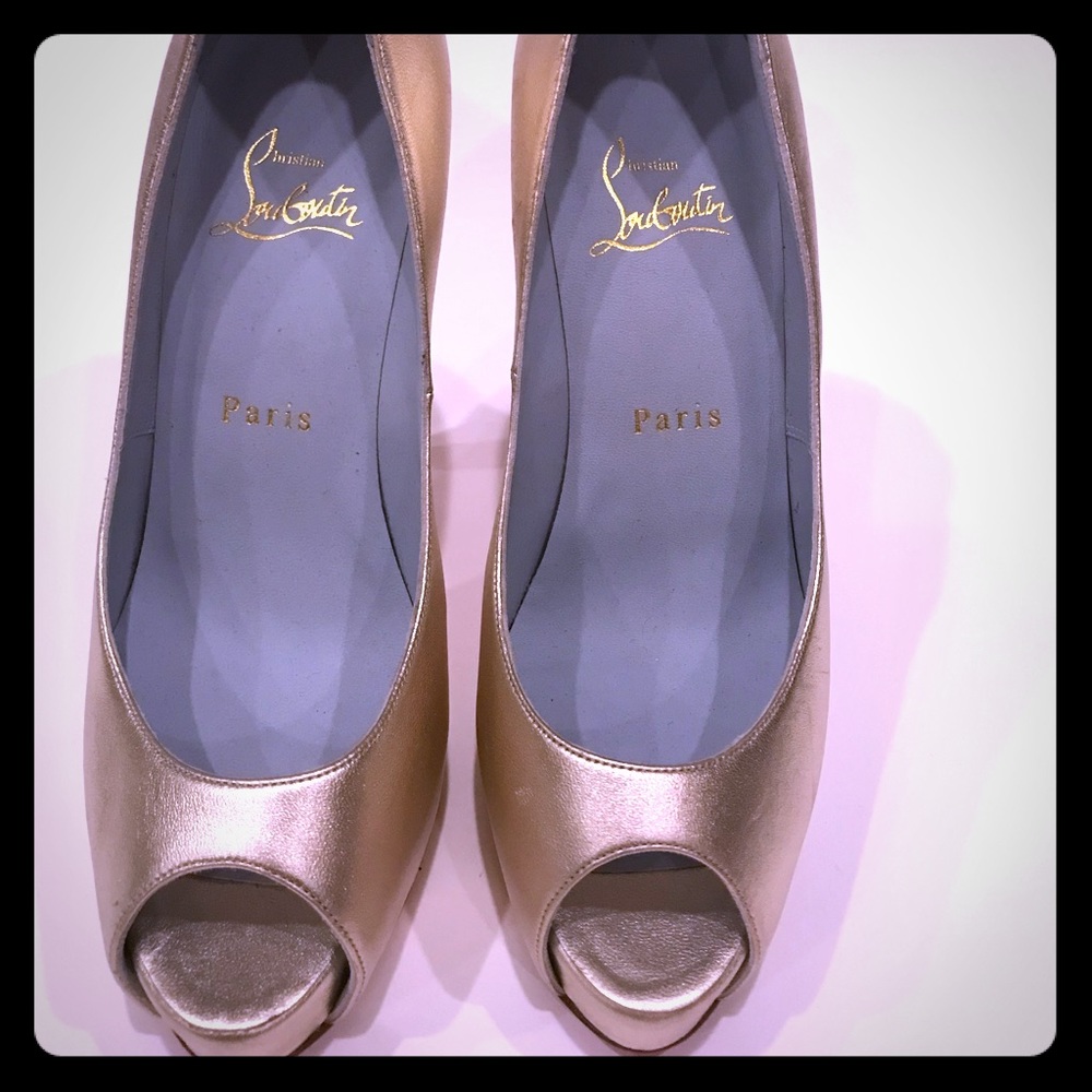 Christian Louboutin Gold peep toe platforms